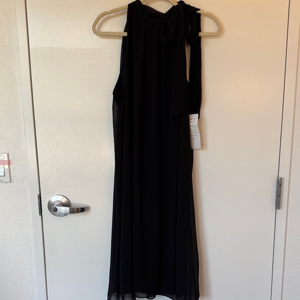 Elegant Black Sleeveless Dress with Adjustable Bow Neckline